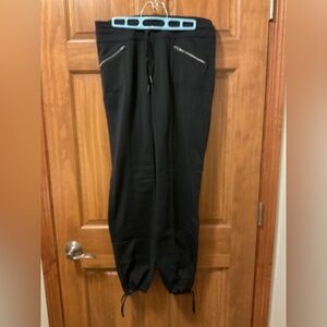 Women’s jogger style pants with 2 zipper pockets.  Drawstring waist.